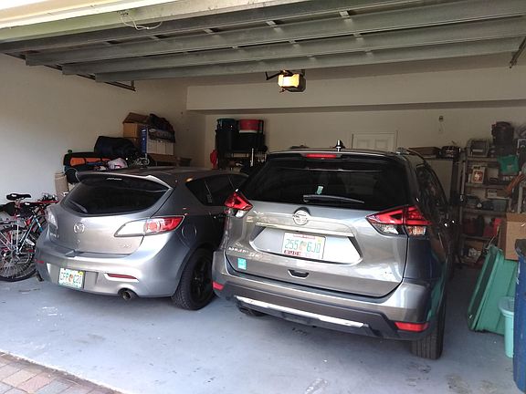 Large garage for 2 cars and lots of storage tooo 