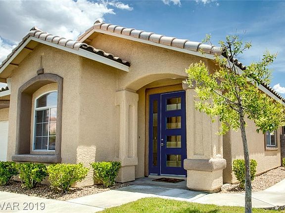 Front entry features beautiful beveled glass door.