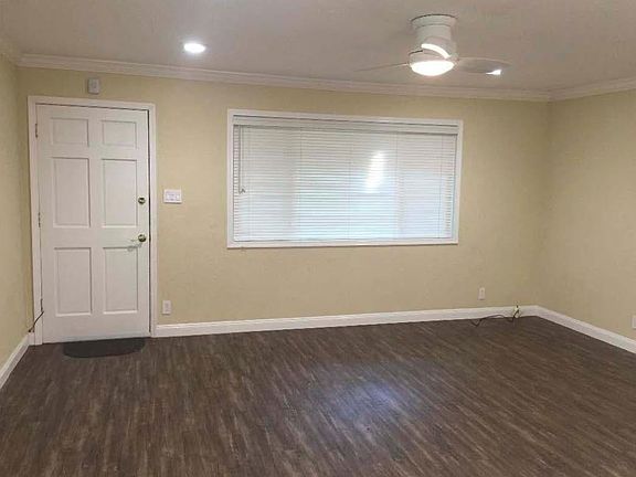 Custom wood blinds on 8 foot wide living room window