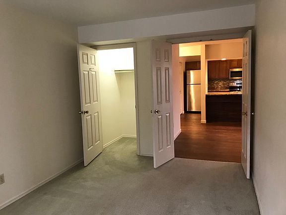 2nd bedroom closet on left, french doors into living room on