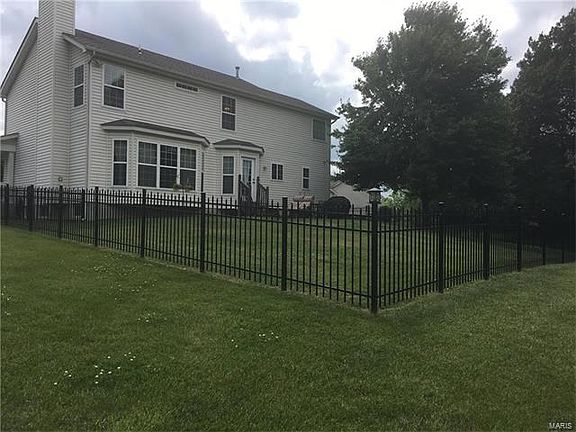 Back view fenced area