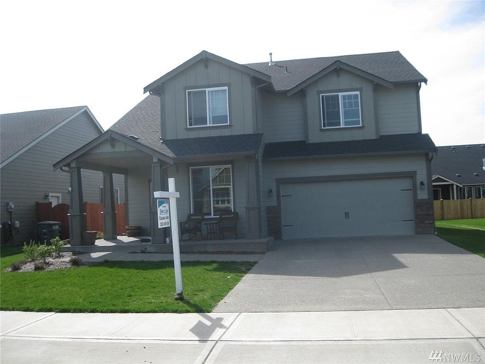 Front view with 2 car garages