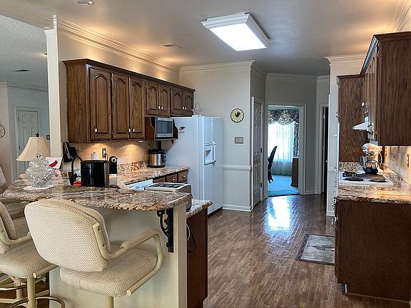 Kitchen looking into Dining 