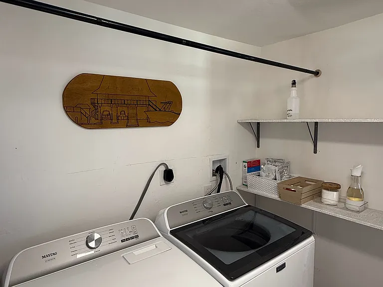 Laundry room shared with back house