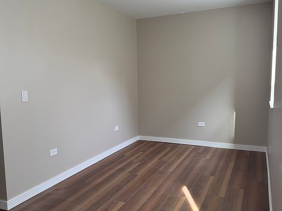 4th image of 5327 S Nashville Avenue # Fl 1ST