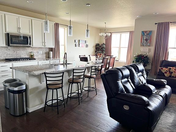 Open Space Living room, kitchen and fire place.