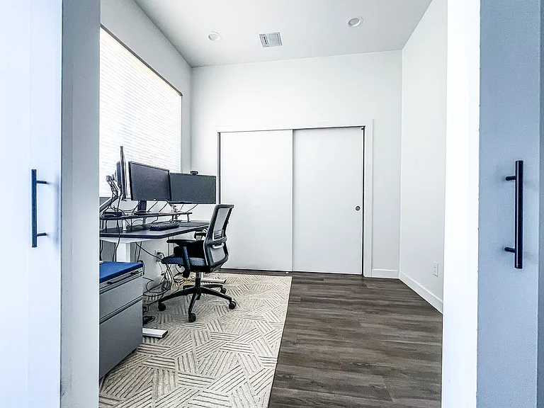 First floor office upon entering from either the front door or garage.