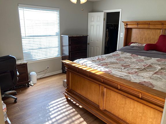 Guest bedroom with walk-in closet (bed in photo is king-sized)