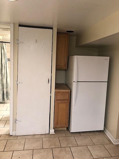 Kitchen and door to bathroom on the Left