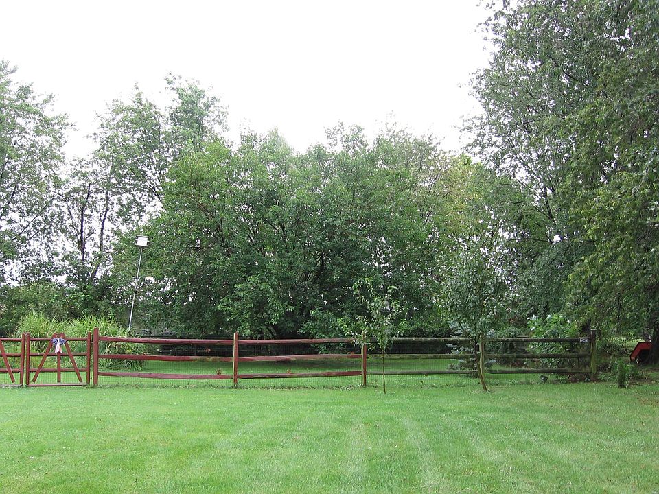 S Front side yard W to E Rear