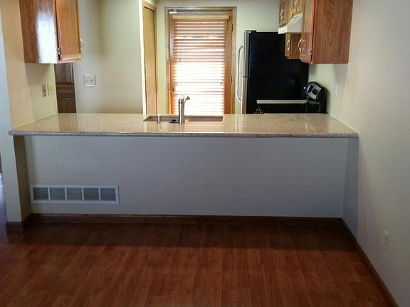Kitchen has granite countertops