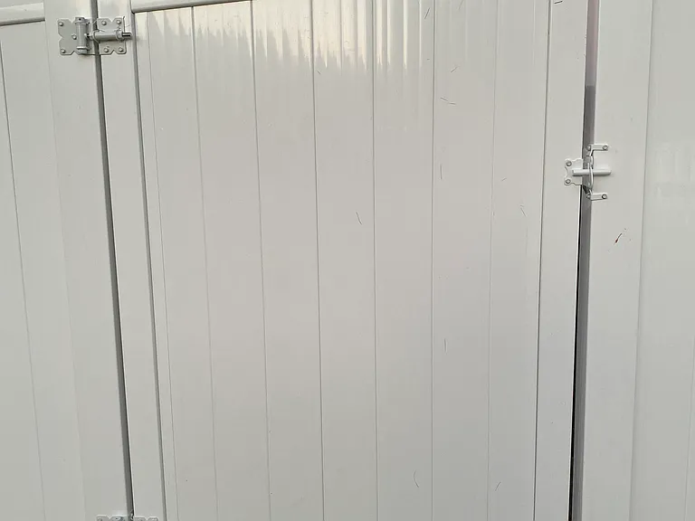 Secured gate to rear yard