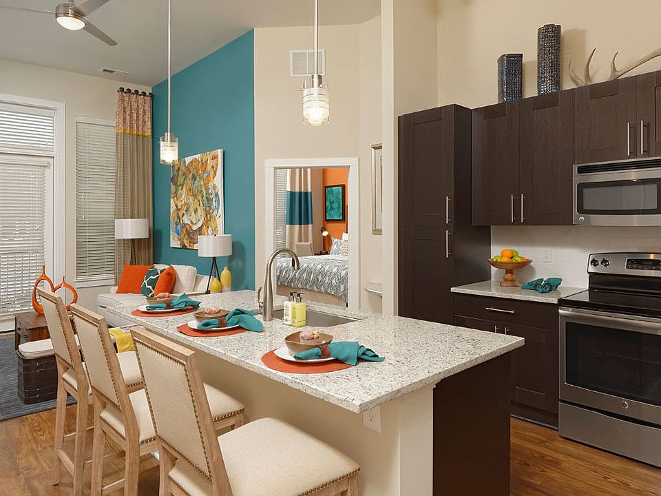 Modern kitchens with solid wood cabinetry, granite counters and stainless appliances