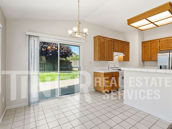 4th image of 8560 Harvest House Way