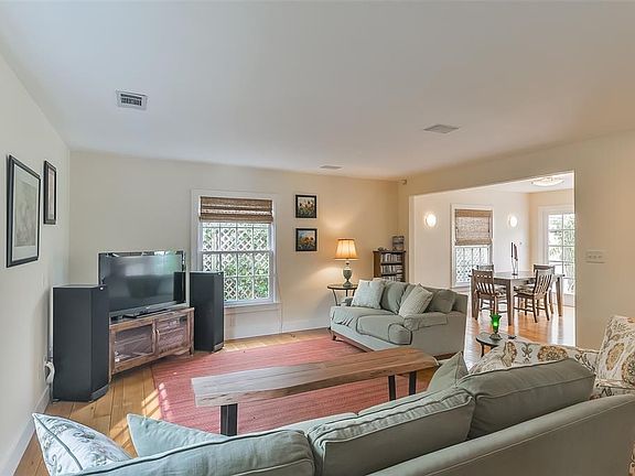 Living room opens to dining and kitchen