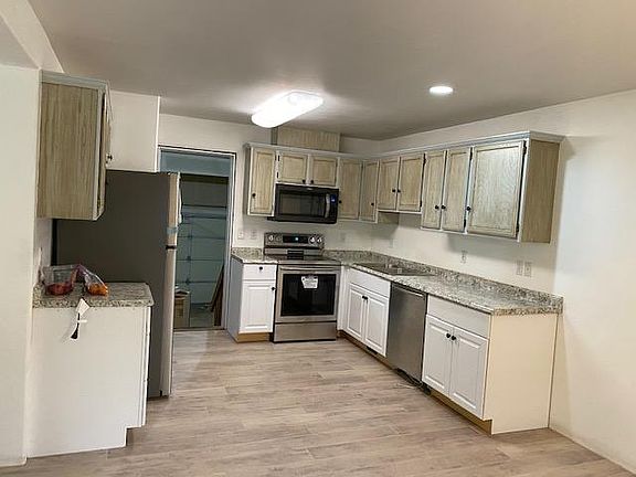 New floor, kitche cabinets and countertops + appliances