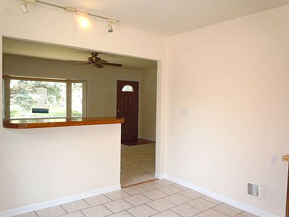 Eat-In Area in Kitchen with Open Pass-thru Window