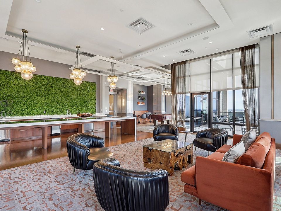 community room with couches and chairs