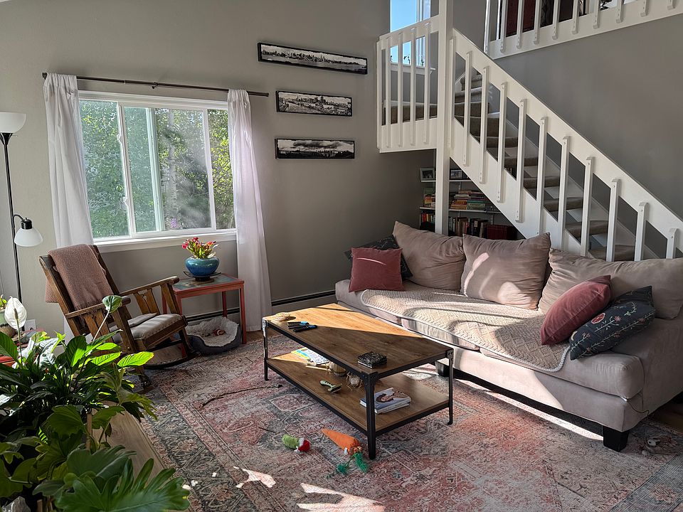 Living Room with stairs to loft