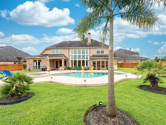 This stunning home sits on an over-sized cul-de-sac lot backing to a green space and offers plenty of yard options for the whole family.