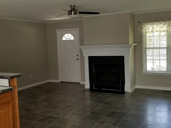 open living area with gas fireplace