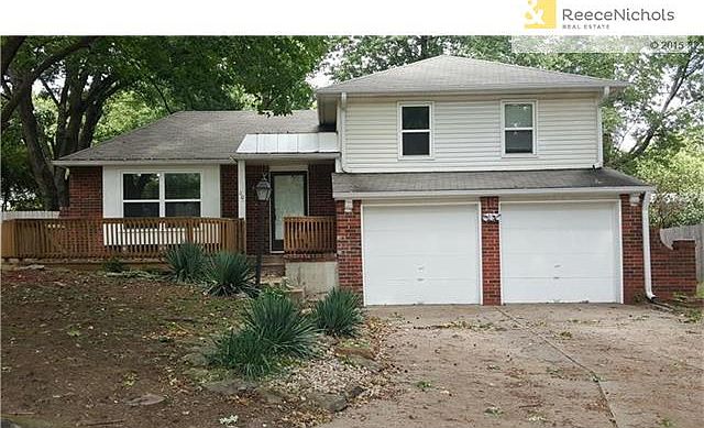 All brick with vinyl siding in front and soffits.  End of cul-de-sac