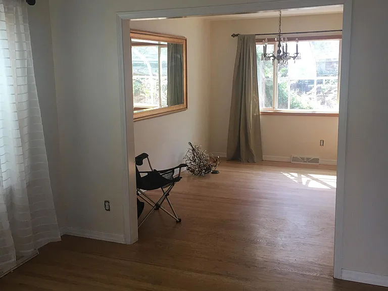 View of Dining Room from Living Room. Dining Room looks out