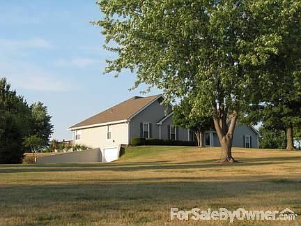 West Side of Home : 3rd garage. Deck sits just behind it on the north side.