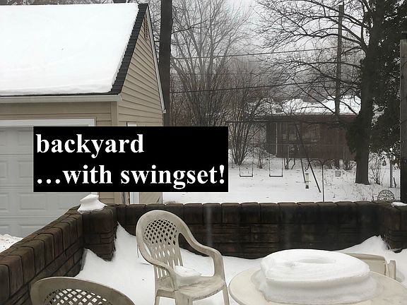 backyard and 2-car garage