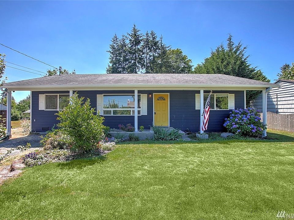 Welcome home to Cascade, where this charming remodeled rambler is waiting for you! Hardwood floors and an open concept welcome you to this 4 bedroom, 2 bath home. Craftsman touches throughout. Delight in the island kitchen with gas cooktop while enjoying open sight lines to the dining area, keeping you connected with guests. A spacious master bedroom with ensuite bathroom will be a place of relaxation. Extend your living and entertaining outside to the large, private, fully fenced yard. Enjoy the deck and patio, as well as solitude and sunny gardening opportunities in raised garden beds. A spacious detached garage outbuilding is also located in the backyard and can be accessed by vehicles through a full sized gate in front. Enjoy features like white paneled doors and trim, updated lighting, vinyl windows and more. Fantastic commuter location with easy access to freeways, airport, hospital, major retail, dining & business hubs.  