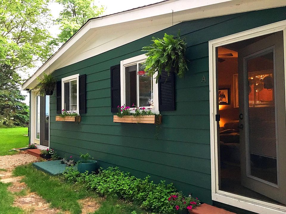 3201 Douglas Woods Dr. has a great country cottage feel. 