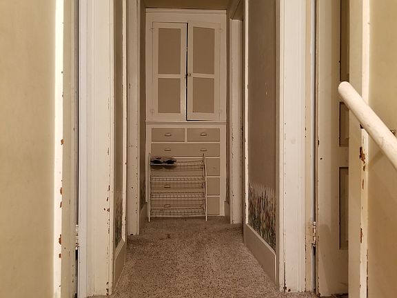 Upstairs hallway with storag