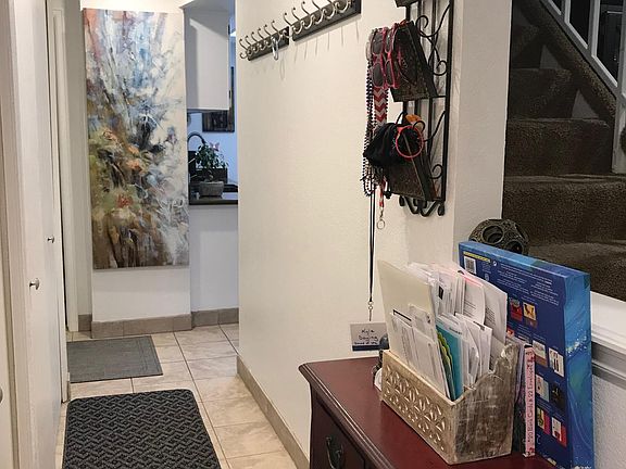 Excellent lighting. Laundry room is hidden behind the doors on the left.