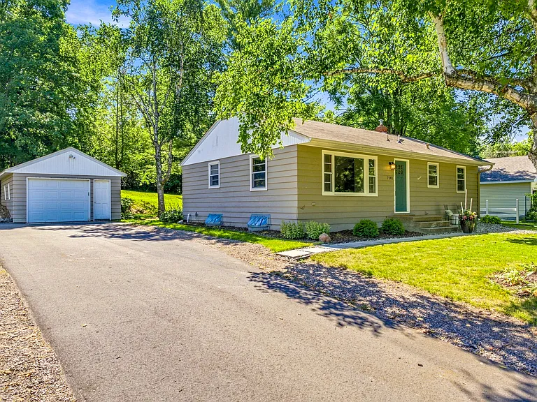 Plenty of parking on the paved driveway as well as in the single car detached garage with garage door opener