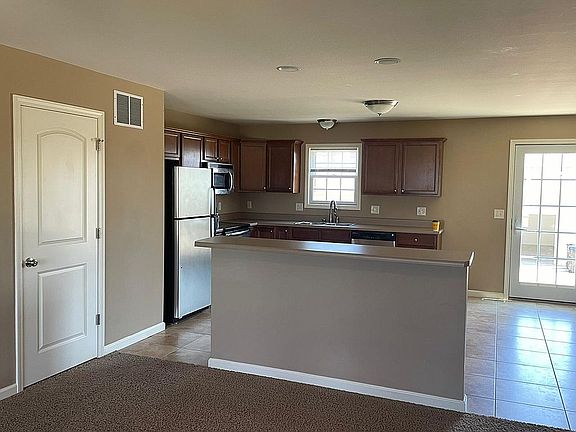 Coat Closet to the left 