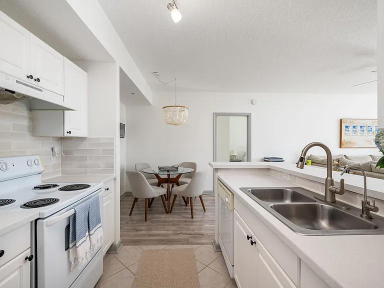 New stainless steel range, dishwasher, refrigerator and microwave will be installed prior to rental period