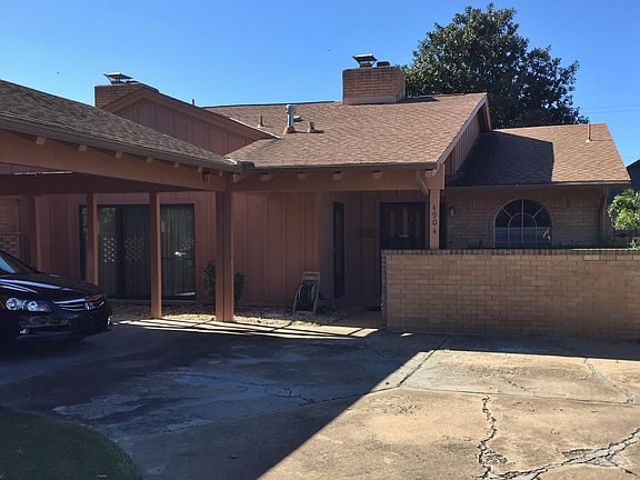 View of Carport and Front of Property