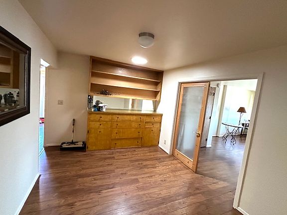 Dining, common area with built in hutch.