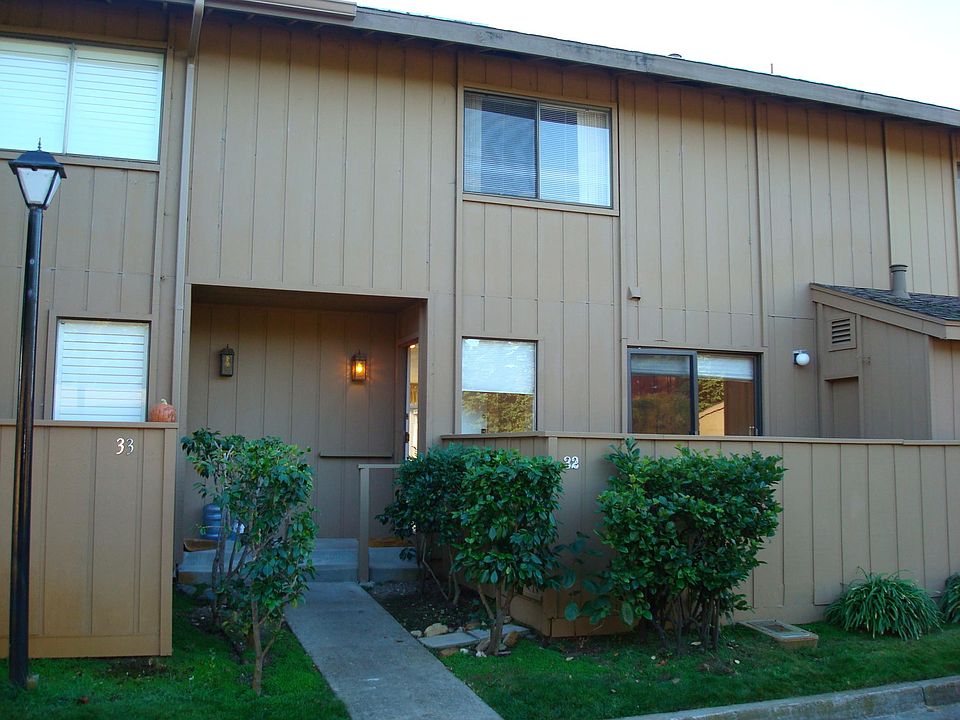 front entry and enclosed patio off of den