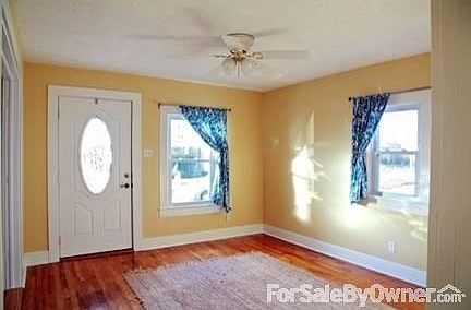 Entry way : The front door opens into this quaint family or living room.