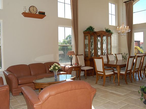 Dramatically High Ceilings Brighten the Living/Dining Room!