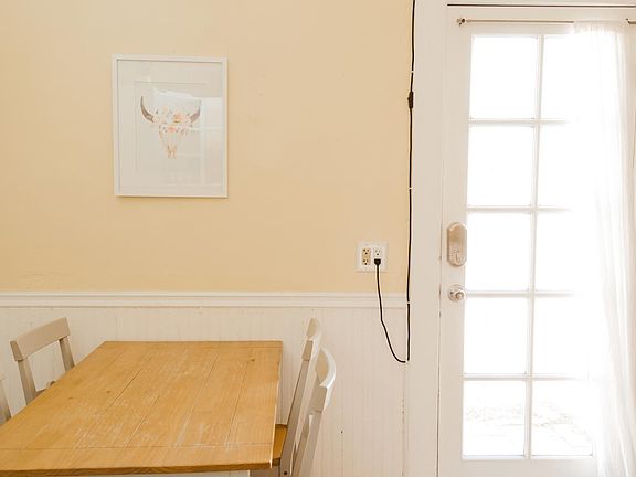 Eat-in kitchen and door to private outdoor space