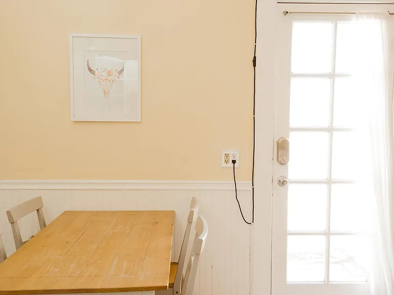 Eat-in kitchen and door to private outdoor space