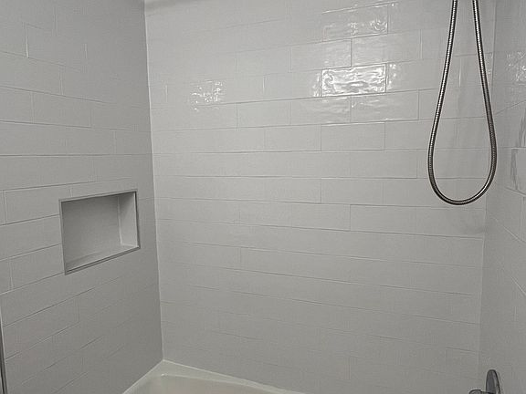 Full size ceramic tub and shower