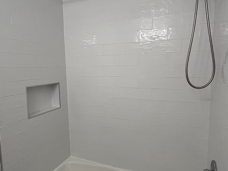 Full size ceramic tub and shower