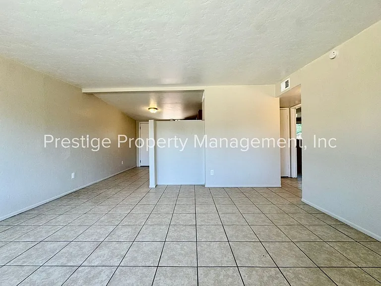 2302-2312 N Ralph Ave — Photo 2
