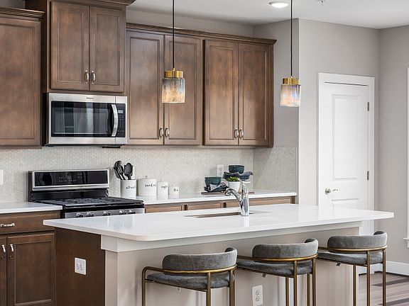 Model Representation - Stunning Kitchen with Stainless Steel Appliances