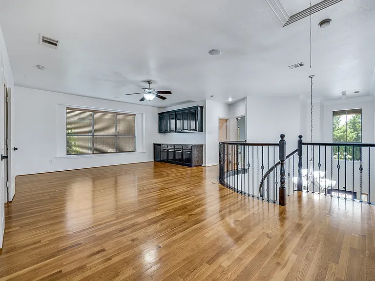 2nd floor gameroom with bar.