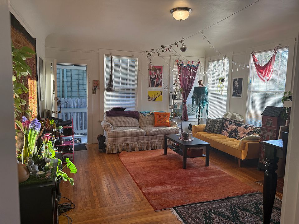 Living Room. Beautiful hardwood floors, lots of great light, calm and inviting space.