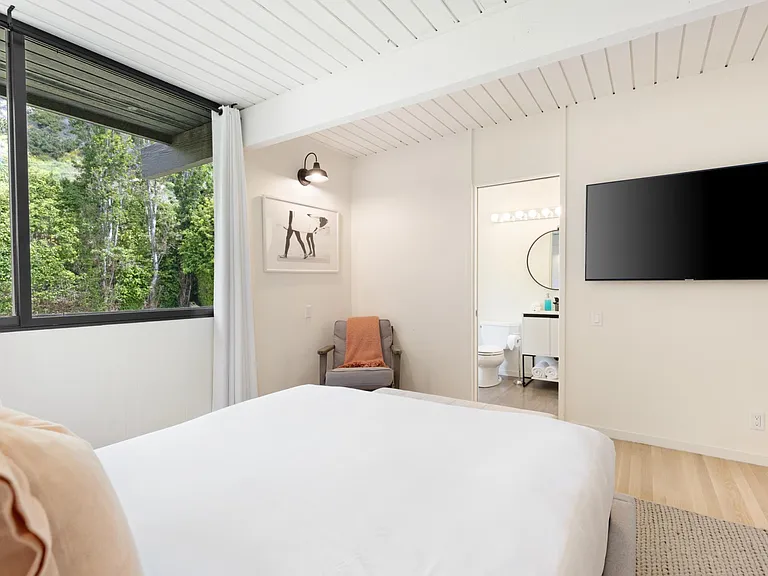 Lay down on the comfortable bed for a nap or switch on the flat-screen TV in the 2nd Guest Bedroom
